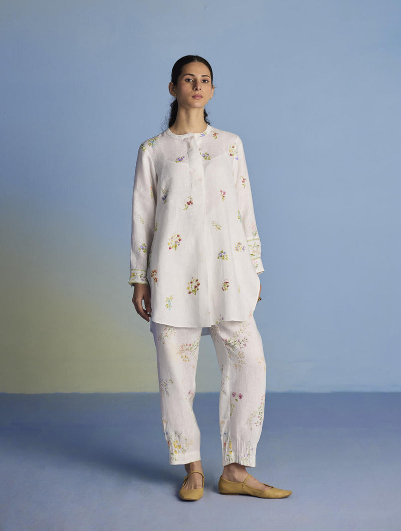 Anya Hand-Embroidered Floral Linen Kurta - White linen by Manan in white color for women Worldwide