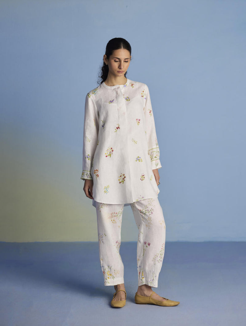 Anya Hand-Embroidered Floral Linen Kurta - White linen by Manan in white color for women Worldwide