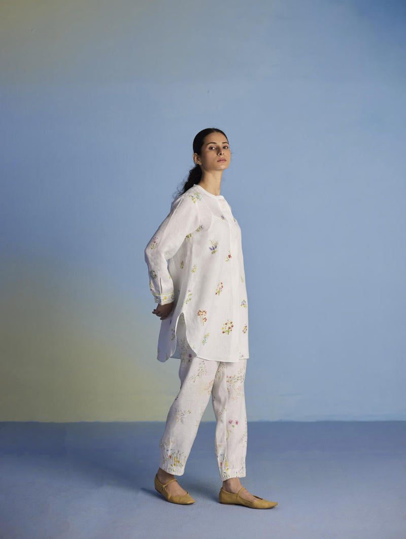 Anya Hand-Embroidered Floral Linen Kurta - White linen by Manan in white color for women Worldwide