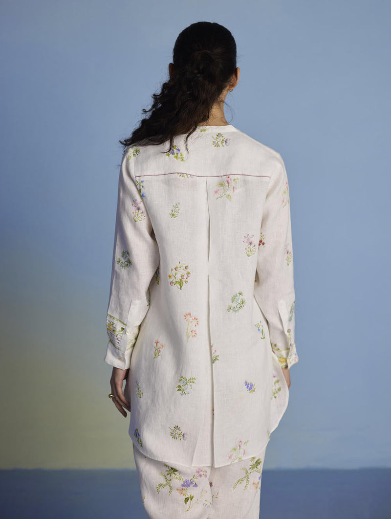 Anya Hand-Embroidered Floral Linen Kurta - White linen by Manan in white color for women Worldwide