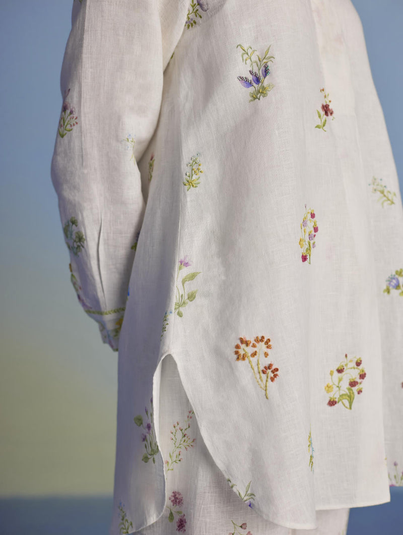 Anya Hand-Embroidered Floral Linen Kurta - White linen by Manan in white color for women Worldwide