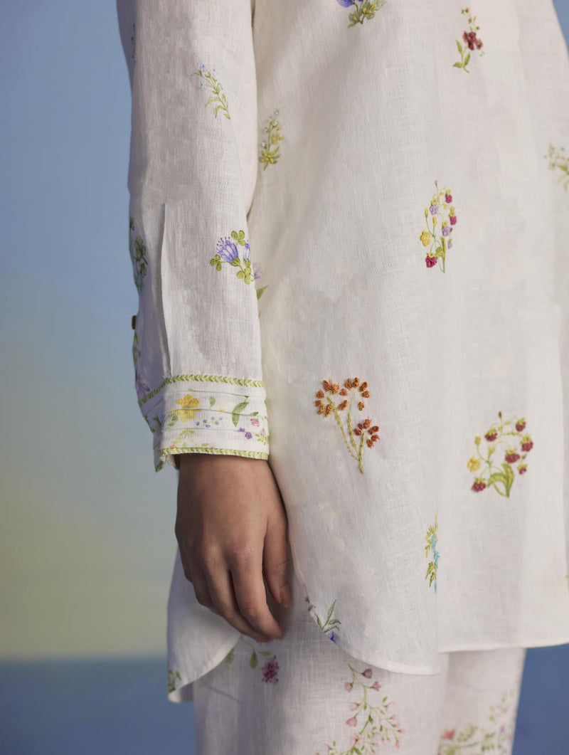 Anya Hand-Embroidered Floral Linen Kurta - White linen by Manan in white color for women Worldwide