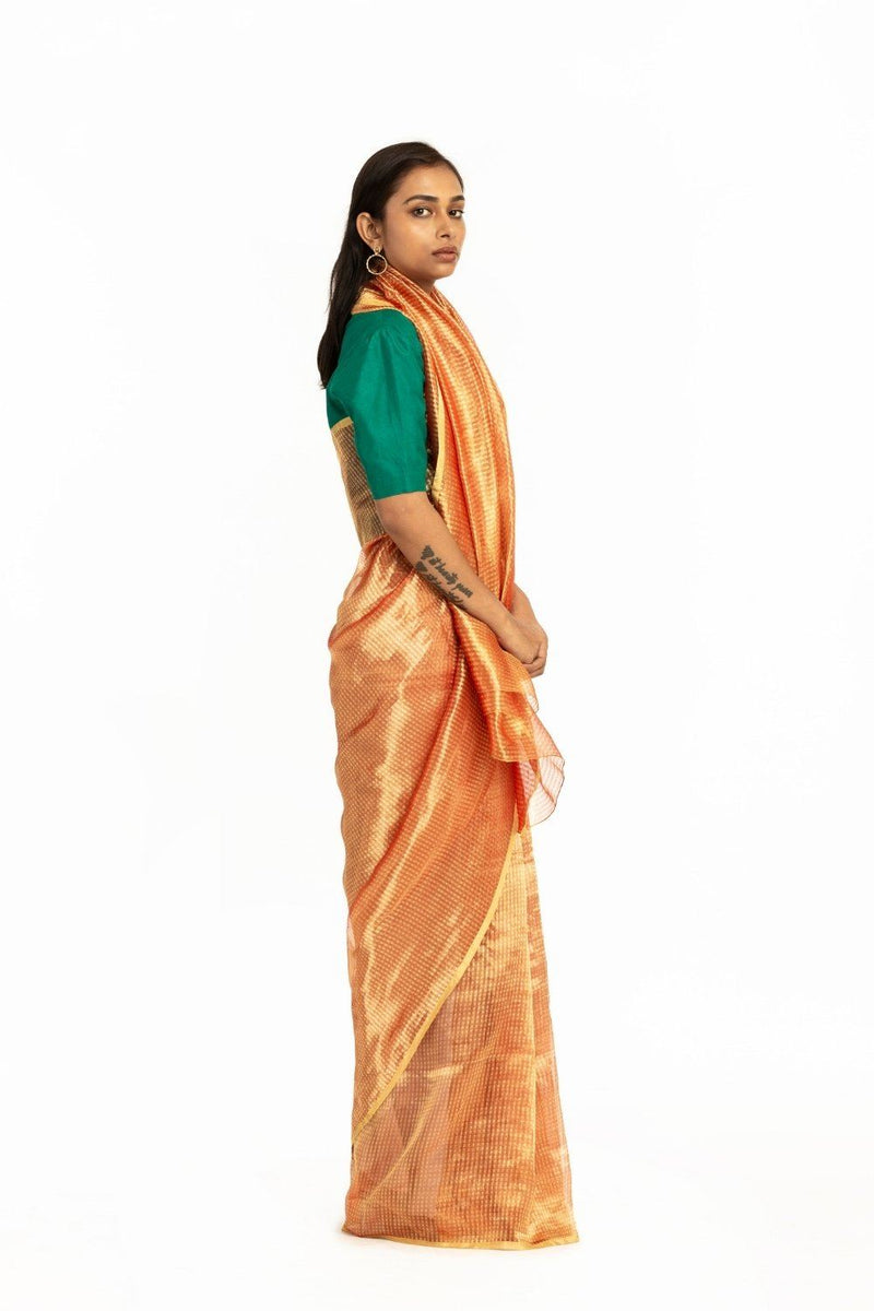 Handwoven liquid Molten Orange Textured Saree by Akaaro for women Worldwide