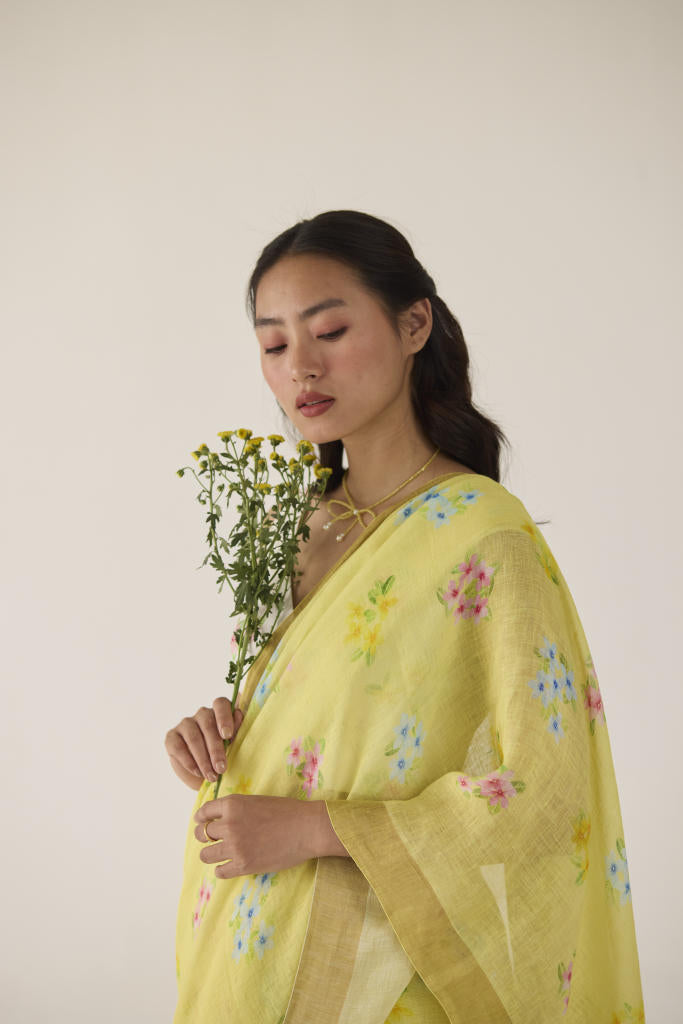 Periwinkle Linen Yellow Sari by Nadiya Paar in yellow color for women Worldwide