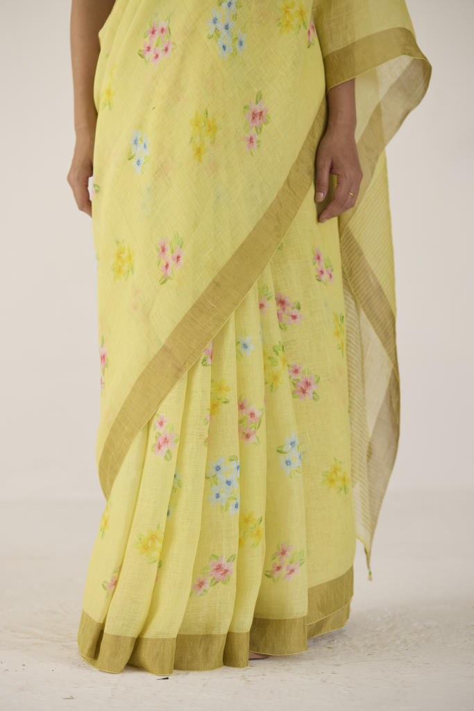 Periwinkle Linen Yellow Sari by Nadiya Paar in yellow color for women Worldwide
