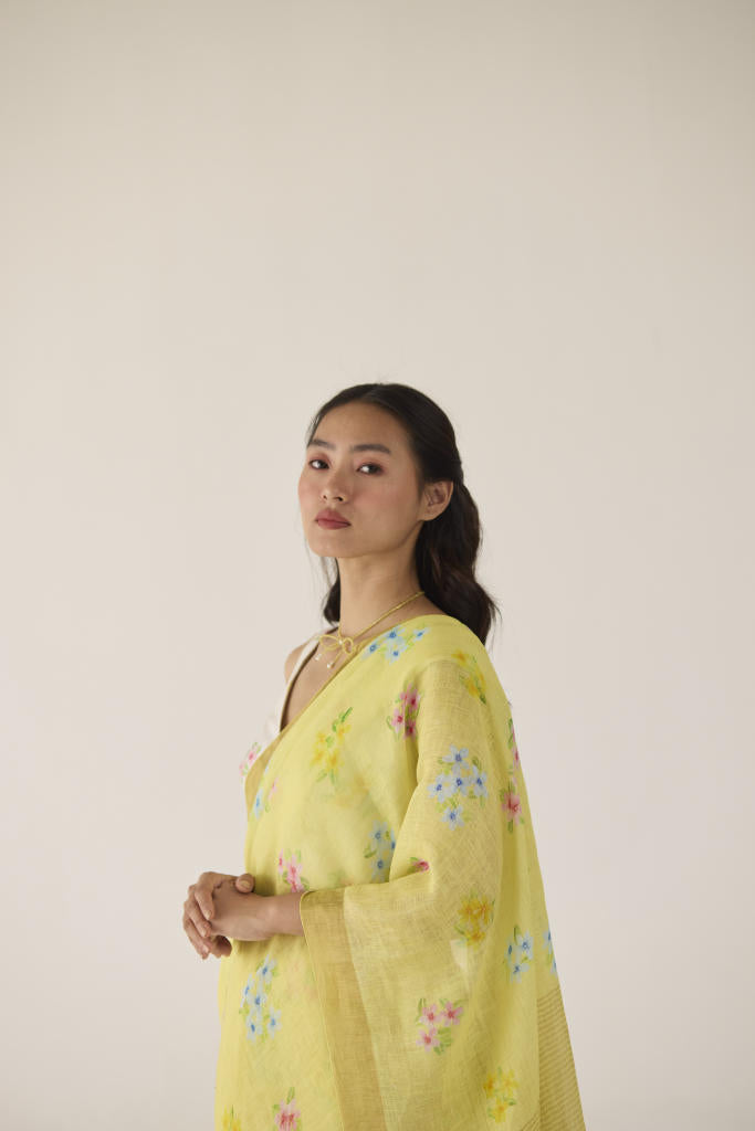 Periwinkle Linen Yellow Sari by Nadiya Paar in yellow color for women Worldwide