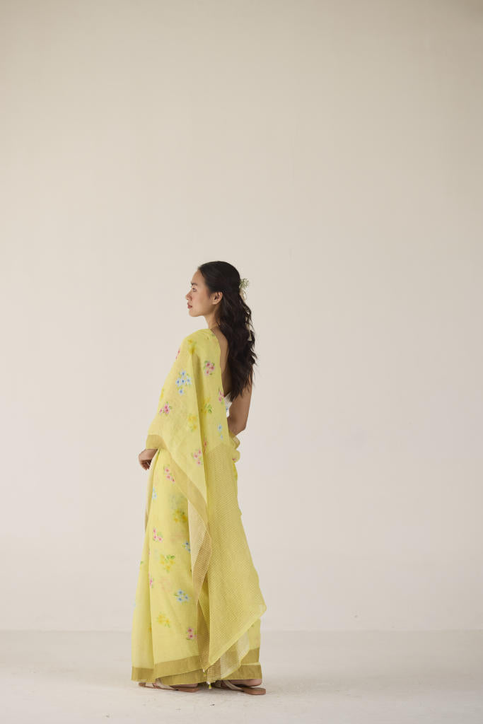 Periwinkle Linen Yellow Sari by Nadiya Paar in yellow color for women Worldwide