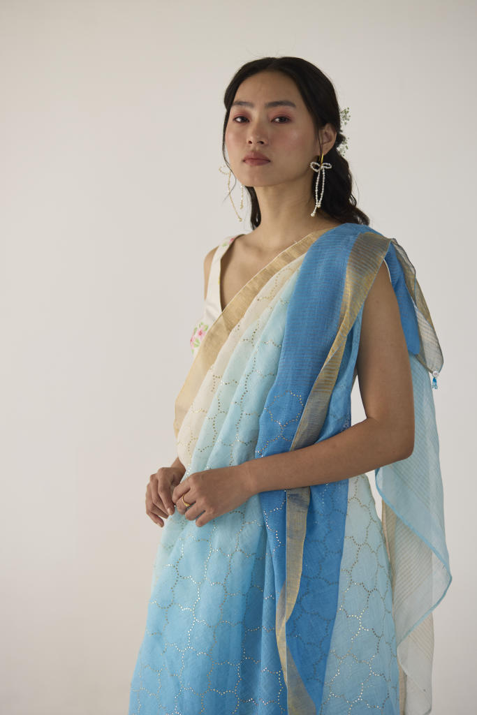 Blue Ombre Linen Sari with Gold Dot Print by Nadiya Paar in blue color for women Worldwide