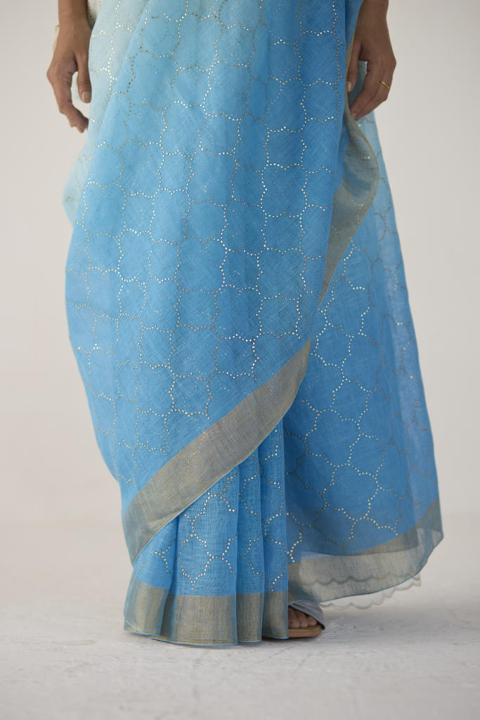 Blue Ombre Linen Sari with Gold Dot Print by Nadiya Paar in blue color for women Worldwide