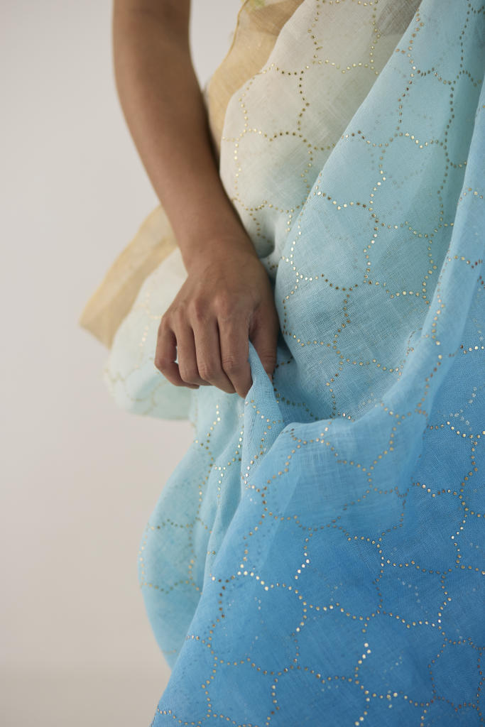 Blue Ombre Linen Sari with Gold Dot Print by Nadiya Paar in blue color for women Worldwide