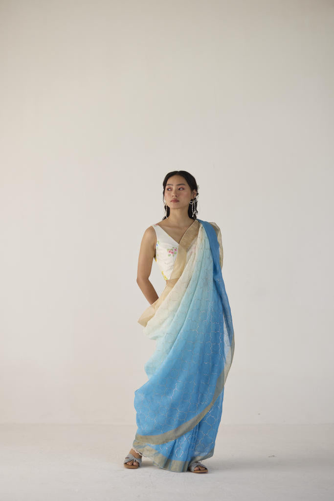 Blue Ombre Linen Sari with Gold Dot Print by Nadiya Paar in blue color for women Worldwide