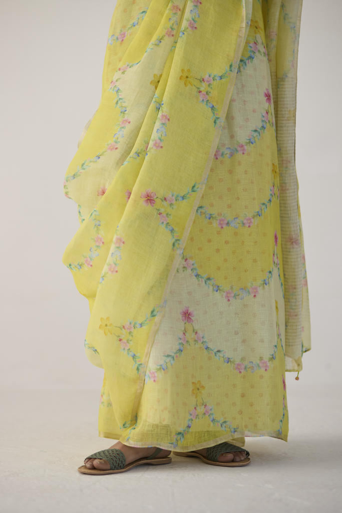 Gulmarg Linen Yellow Sari by Nadiya Paar in yellow color for women Worldwide