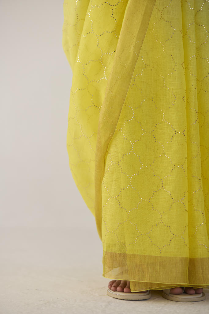 Yellow Ombre Linen Sari with Gold Dot Print by Nadiya Paar in yellow color for women Worldwide