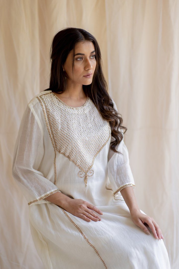 Ivory White Maheem Kurta Set by Nirjara in white color for women Worldwide