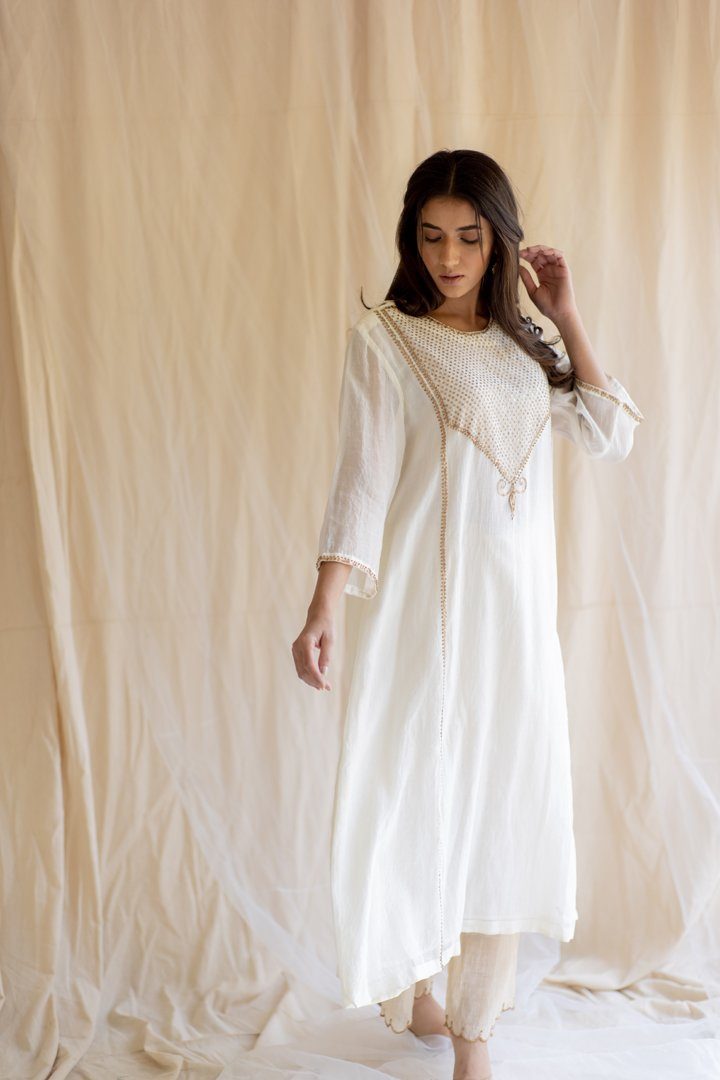Ivory White Maheem Kurta Set by Nirjara in white color for women Worldwide