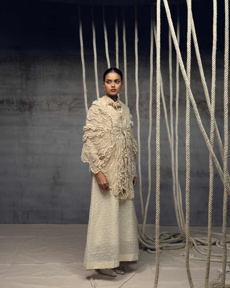 Ivory Crochet Lace Embroidered Cape hand crochet jacket/overlay by Kritika Murarka in ivory for women Worldwide