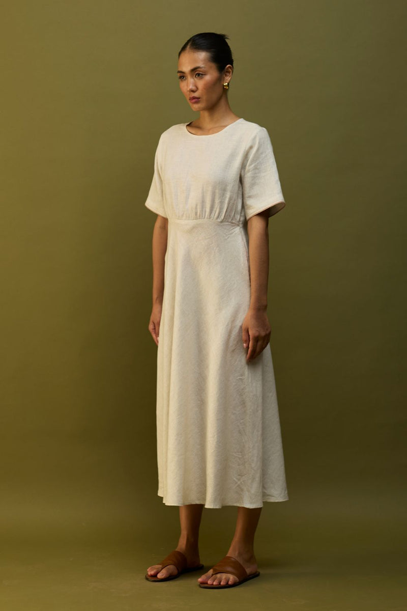 Masaru Buttoned Linen Dress - Off White linen by Manan in ivory color for women Worldwide