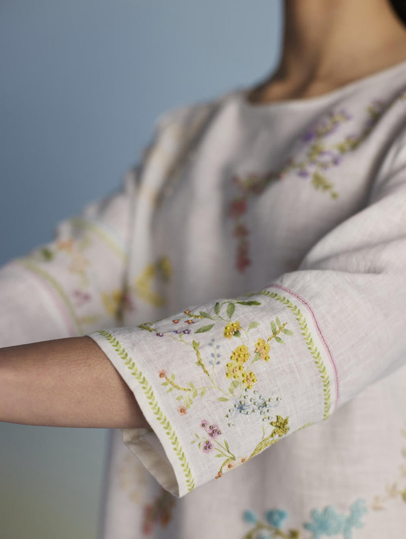 Emra Hand-Embroidered Linen Kurta Set - White linen by Manan in white color for women Worldwide