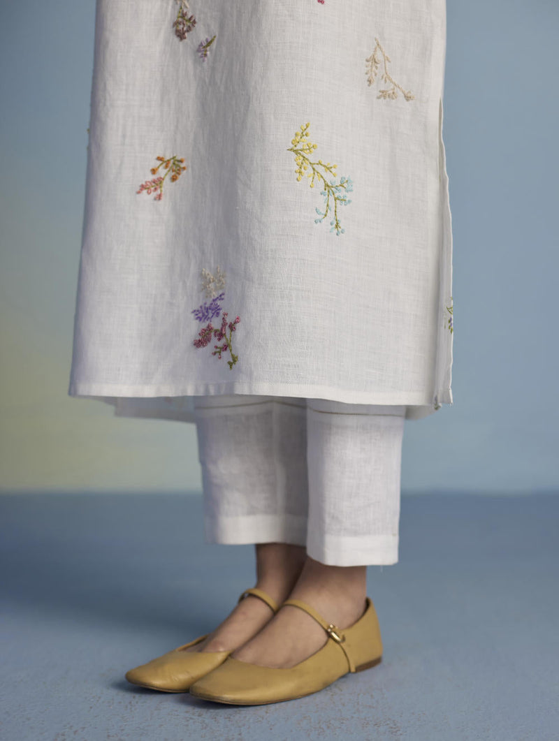 Emra Hand-Embroidered Linen Kurta - White linen by Manan in white color for women Worldwide