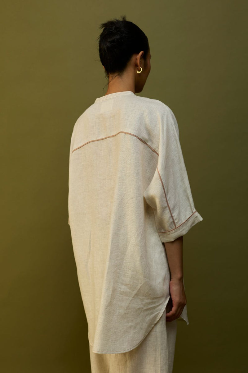 Sumire Curved Hem Linen Top - Off White linen by Manan in ivory color for women Worldwide