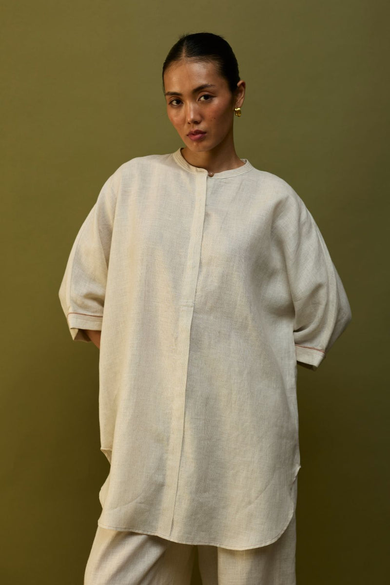 Sumire Curved Hem Linen Top - Off White linen by Manan in ivory color for women Worldwide