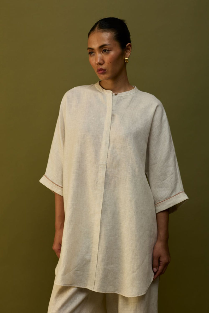 Sumire Curved Hem Linen Top - Off White linen by Manan in ivory color for women Worldwide