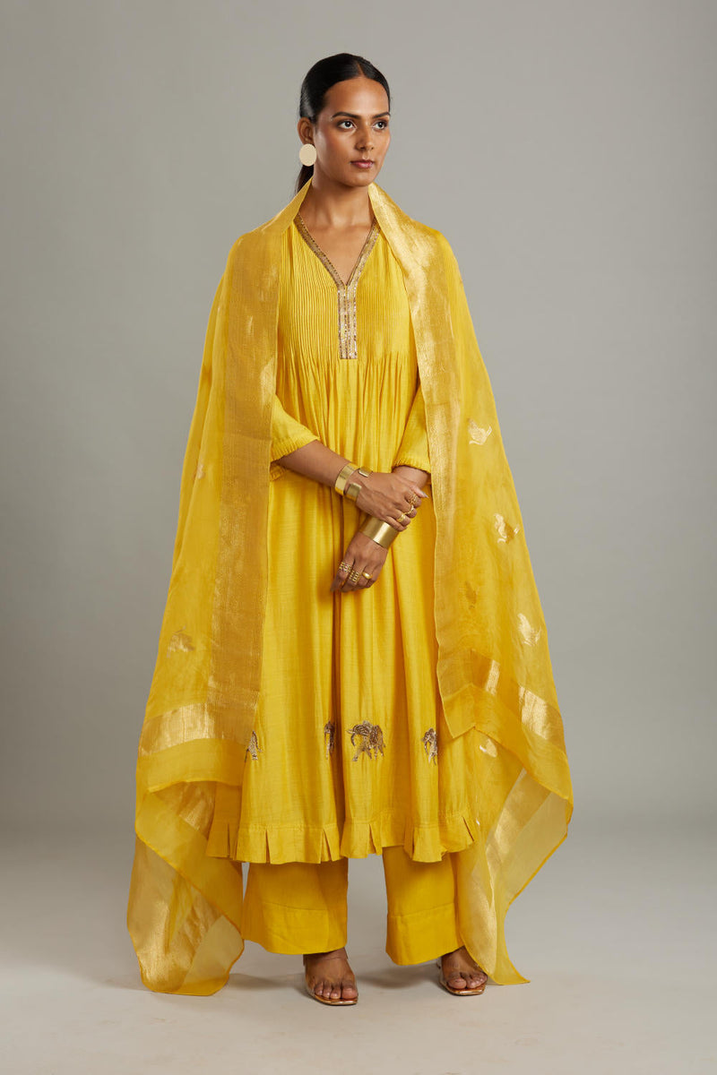 Munga Silk Pintuck full length kurta with embroidered neck and hem with solid pants and butti dupatta Kurta Sets by Myoho for women Worldwide