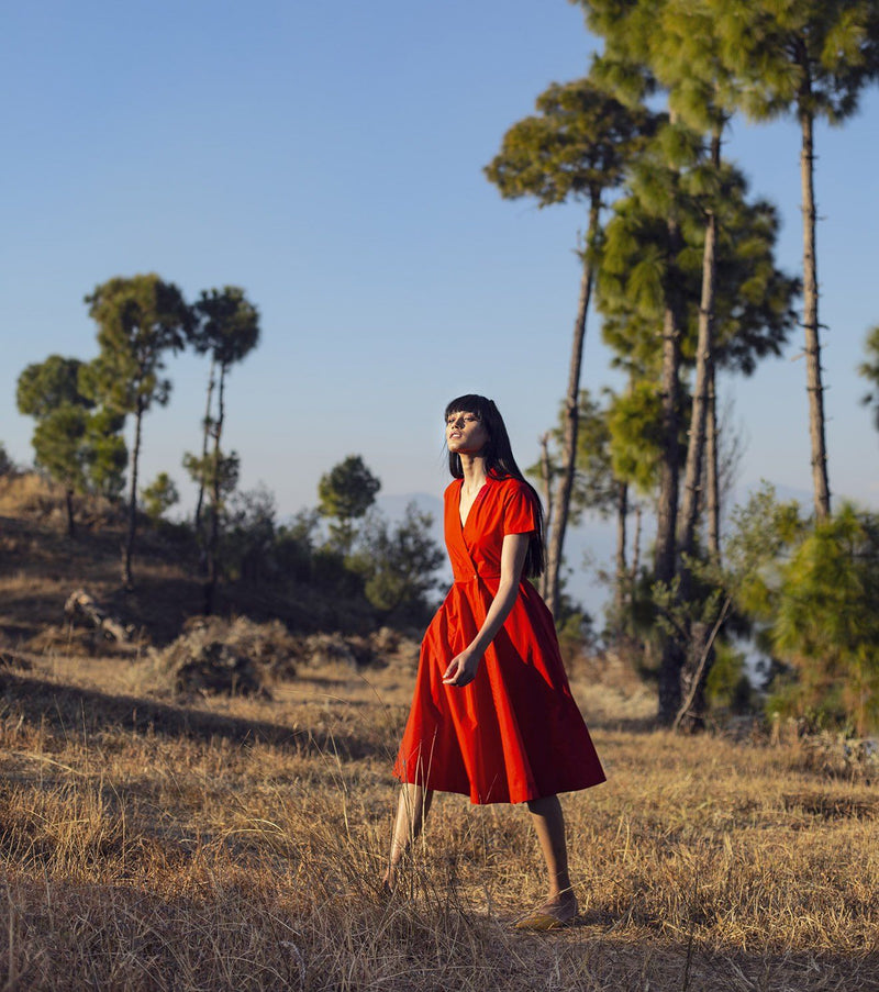 The Woman Afoot by Khara Kapas in red for women Worldwide